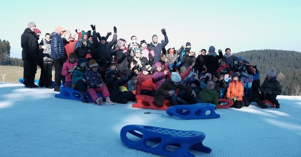 Gruppenfoto von einem Rodelausflug